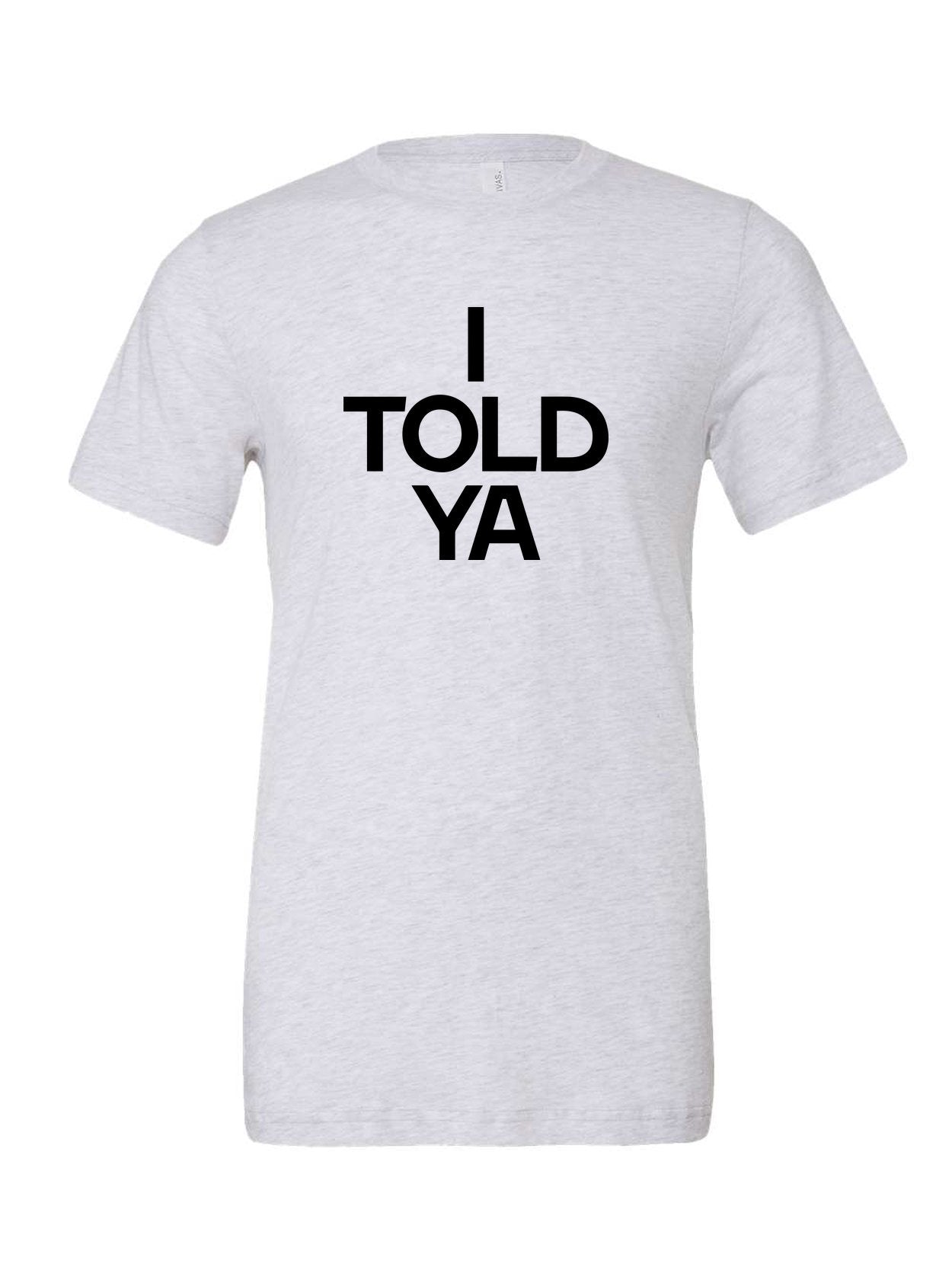 I Told Ya on a white t-shirt