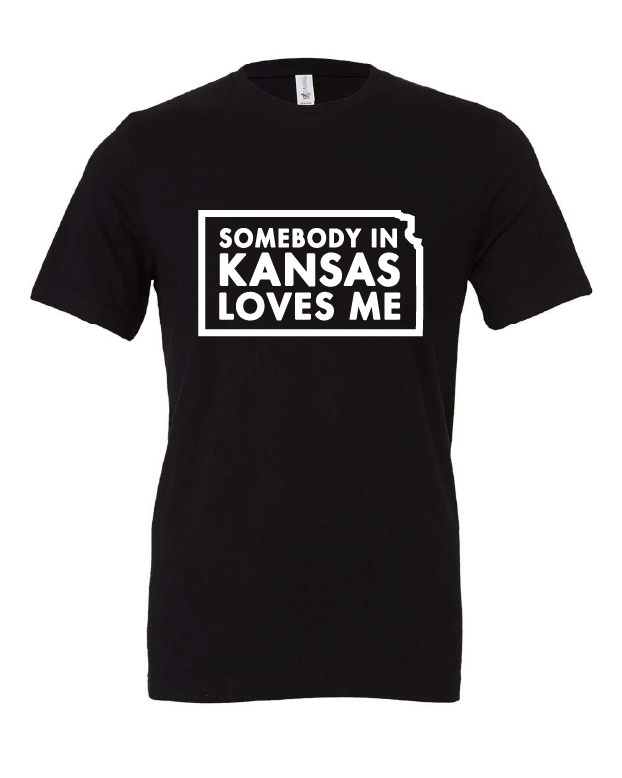 Somebody in Kansas Loves Me design on a black t-shirt