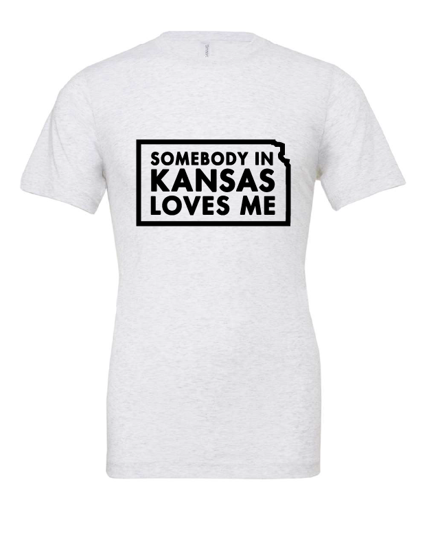 Somebody in Kansas Loves Me design on a white t-shirt